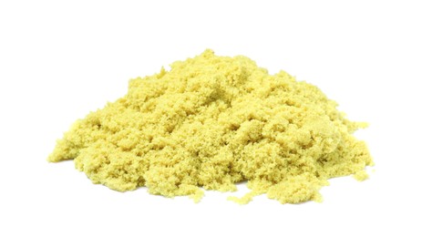 Photo of Pile of yellow kinetic sand on white background