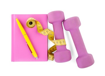 Photo of Dumbbells, notebook and measuring tape isolated on white, top view. Weight loss concept