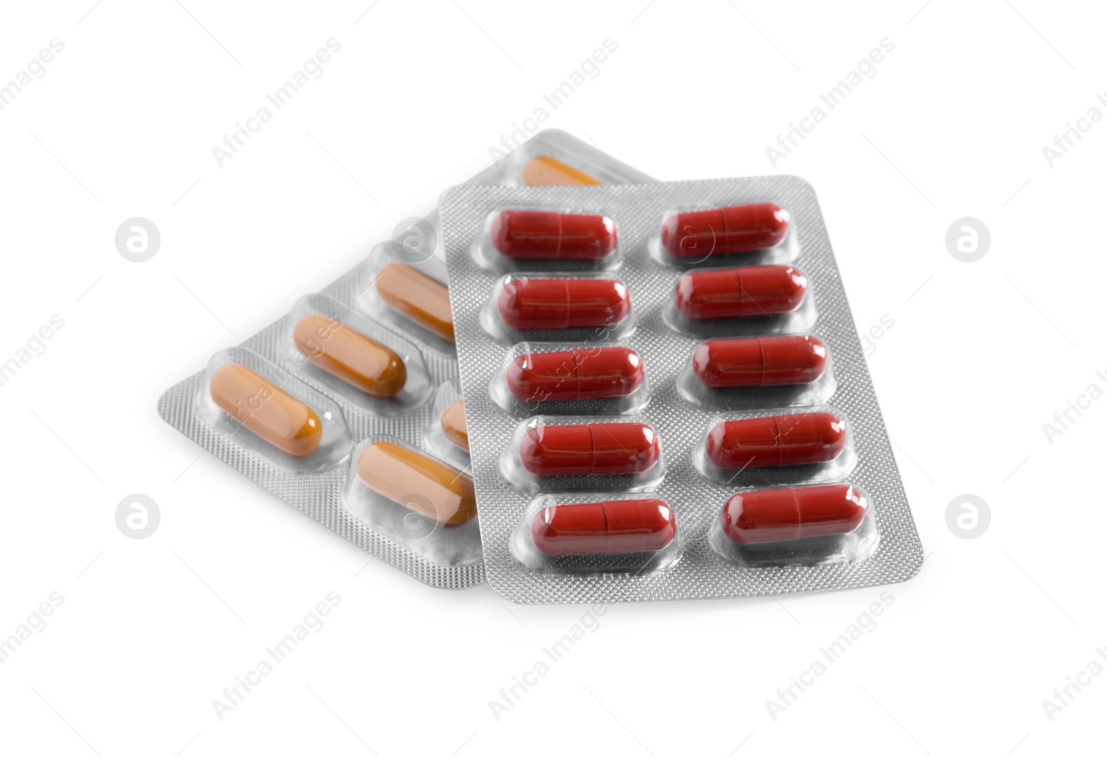 Photo of Blisters with different pills on white background