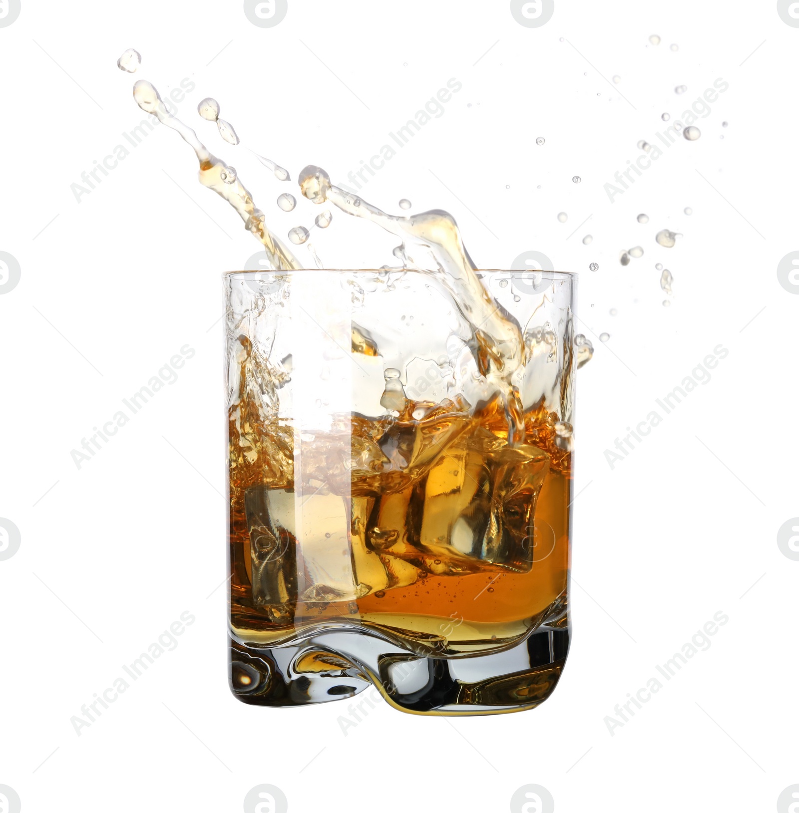 Photo of Whiskey splashing out of glass on white background