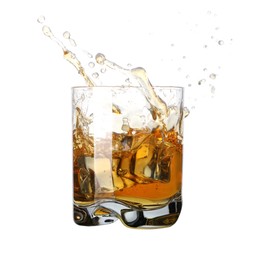 Photo of Whiskey splashing out of glass on white background