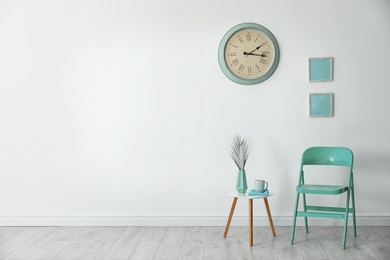 Photo of Stylish room interior with mint decor elements