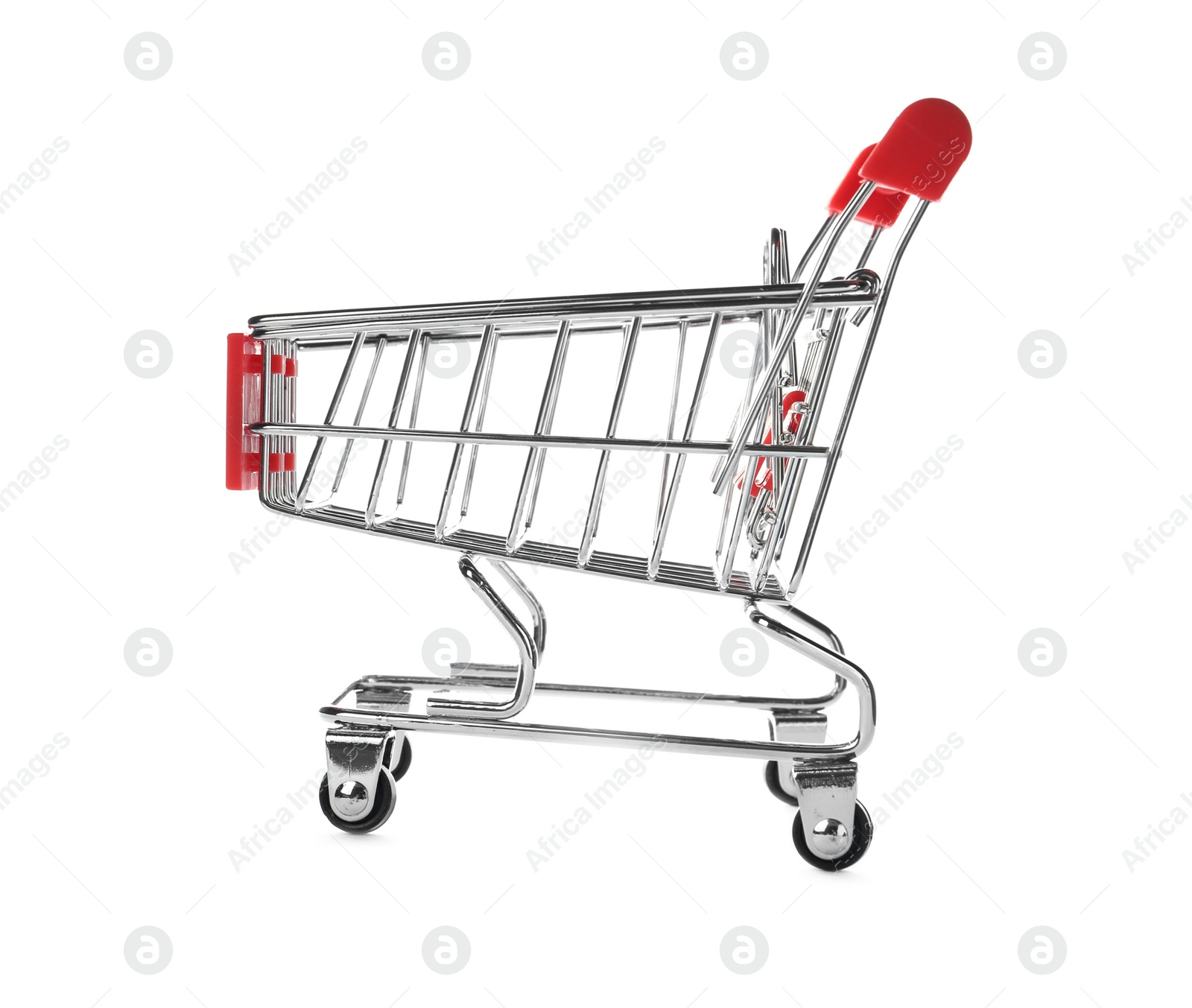 Photo of Empty metal shopping trolley isolated on white