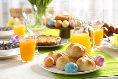 Festive Easter table setting with traditional meal