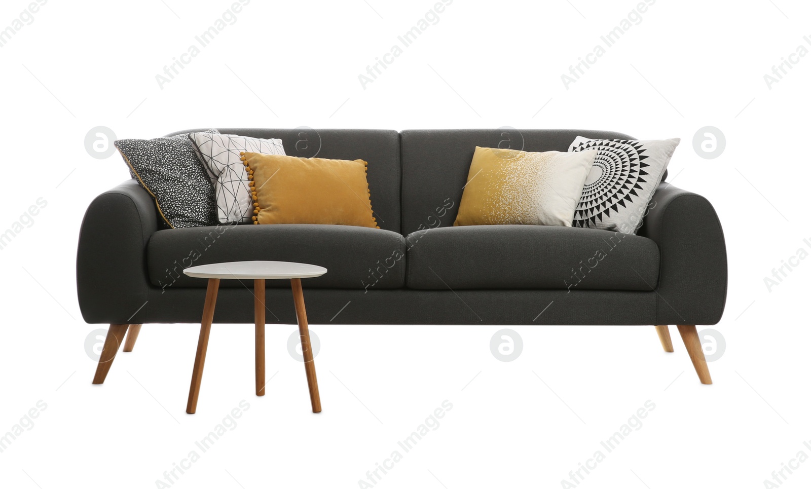 Photo of Comfortable grey sofa with cushions and table on white background. Furniture for living room interior