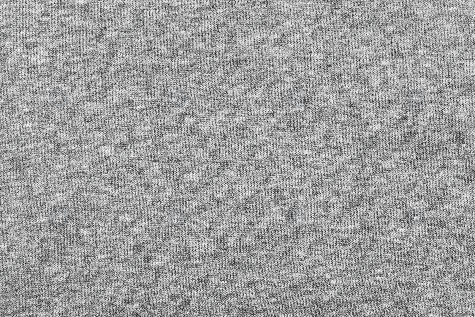 Photo of Texture of cozy warm sweater as background, closeup