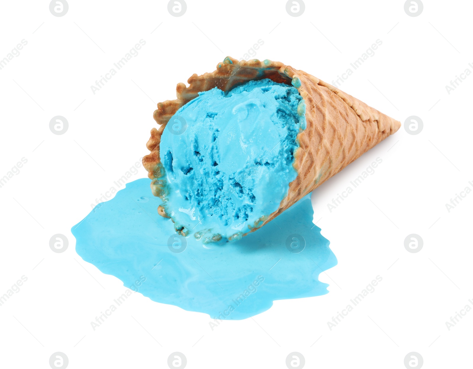 Photo of Melting ice cream in wafer cone on white background