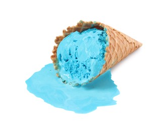 Photo of Melting ice cream in wafer cone on white background