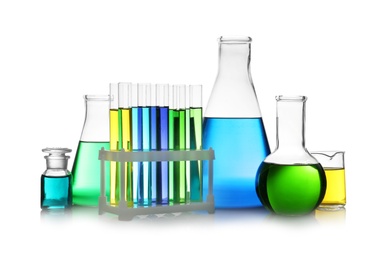 Set of different lab glassware with color liquid isolated on white