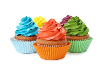 Different delicious colorful cupcakes on white background