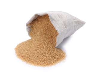 Overturned sack with brown sugar on white background