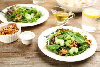 Delicious fresh celery salad on wooden table