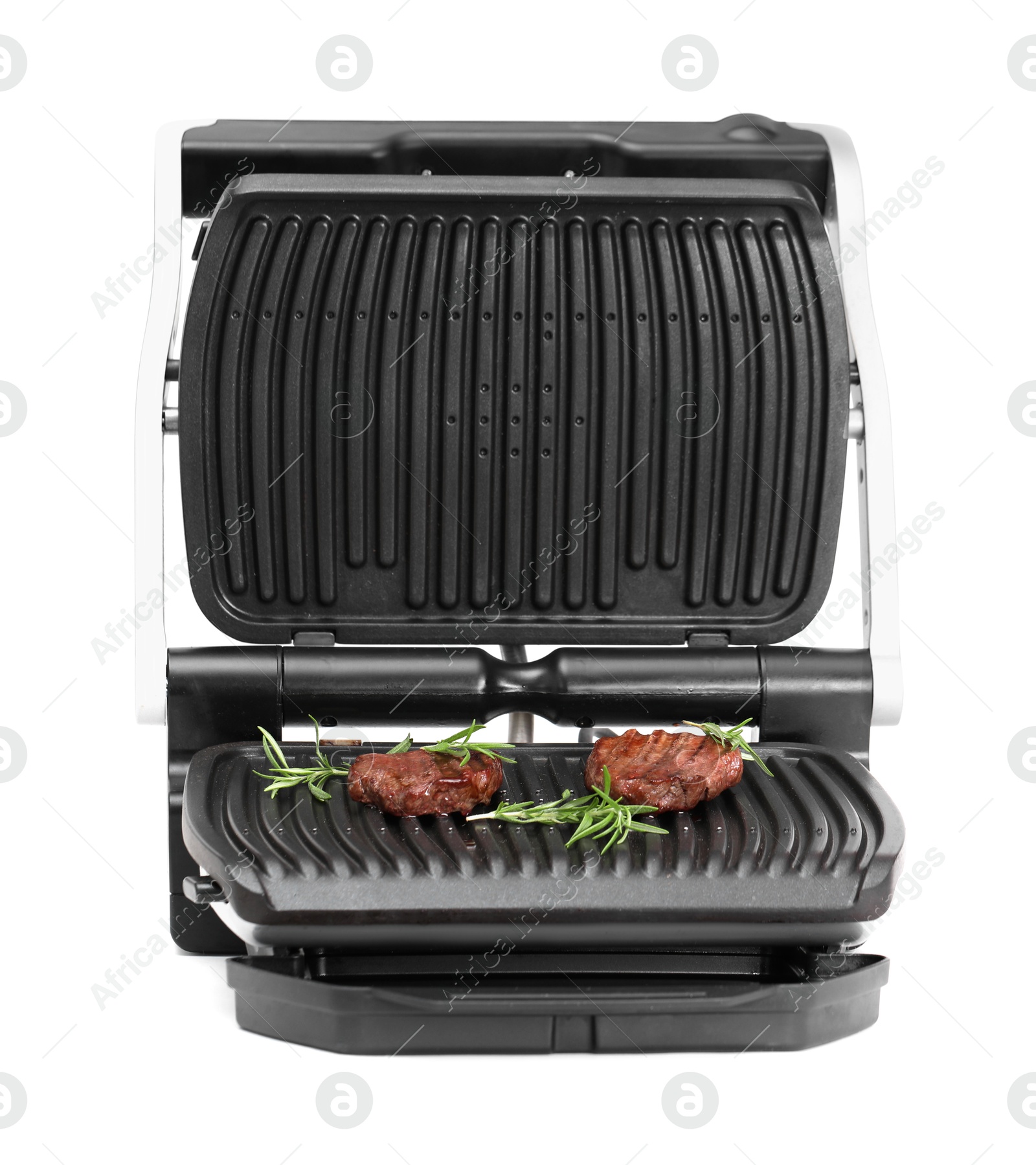 Photo of Electric grill with tasty meat steaks and rosemary isolated on white