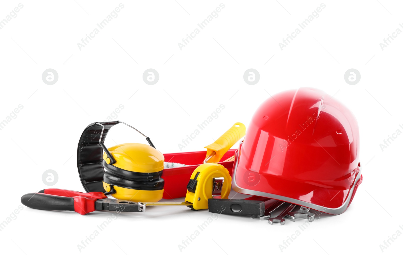 Photo of Different construction tools and hard hat isolated on white