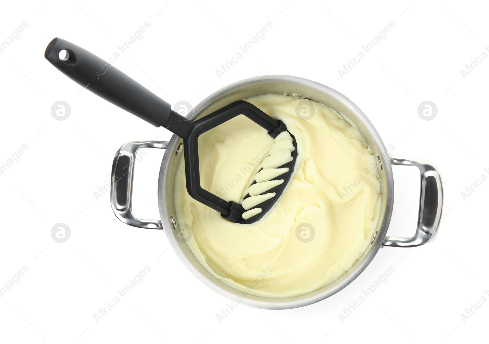 Photo of Pot of freshly cooked homemade mashed potatoes on white background, top view