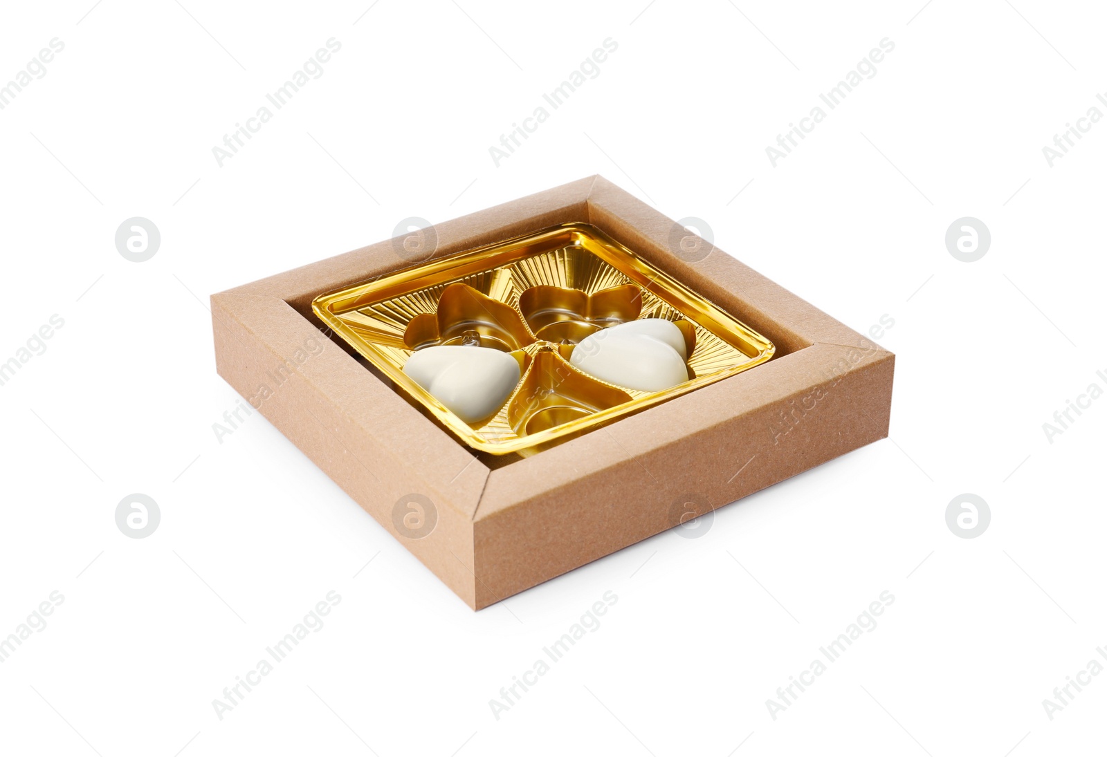 Photo of Partially empty box of chocolate candies isolated on white