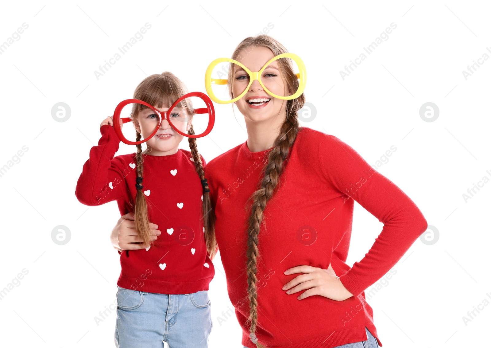 Photo of Happy woman and daughter with funny glasses on white background