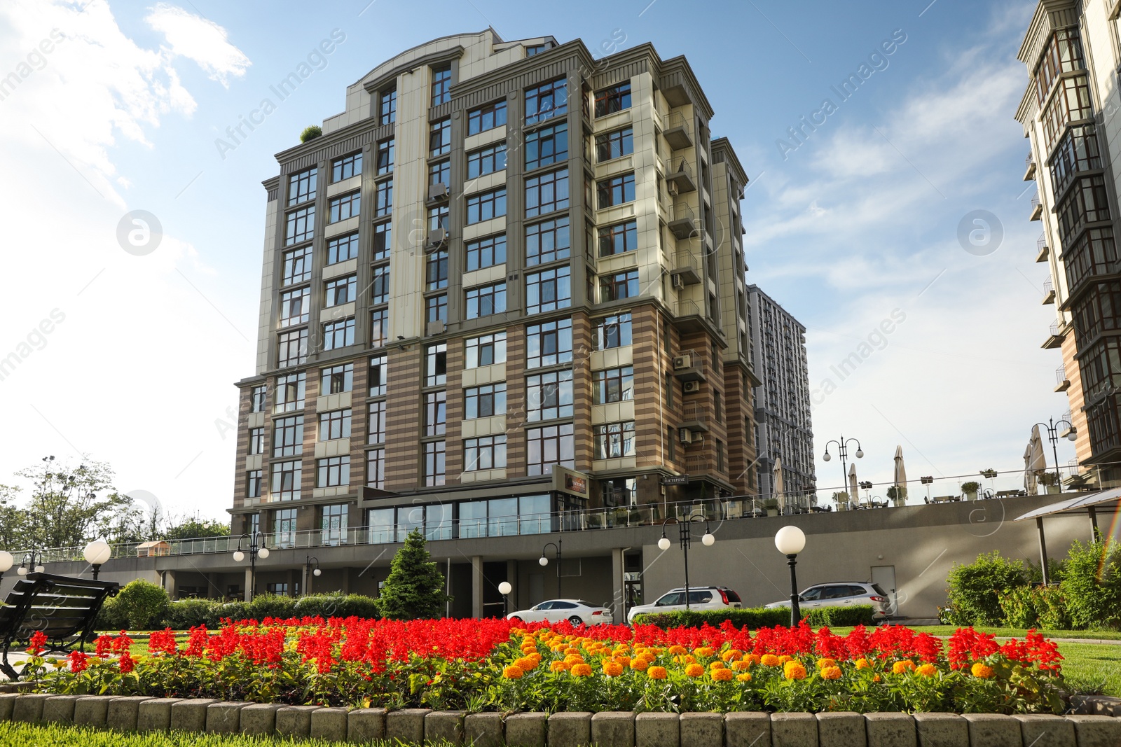 Photo of KYIV, UKRAINE - MAY 21, 2019: Beautiful view of modern housing estate in Pecherskyi district on sunny day