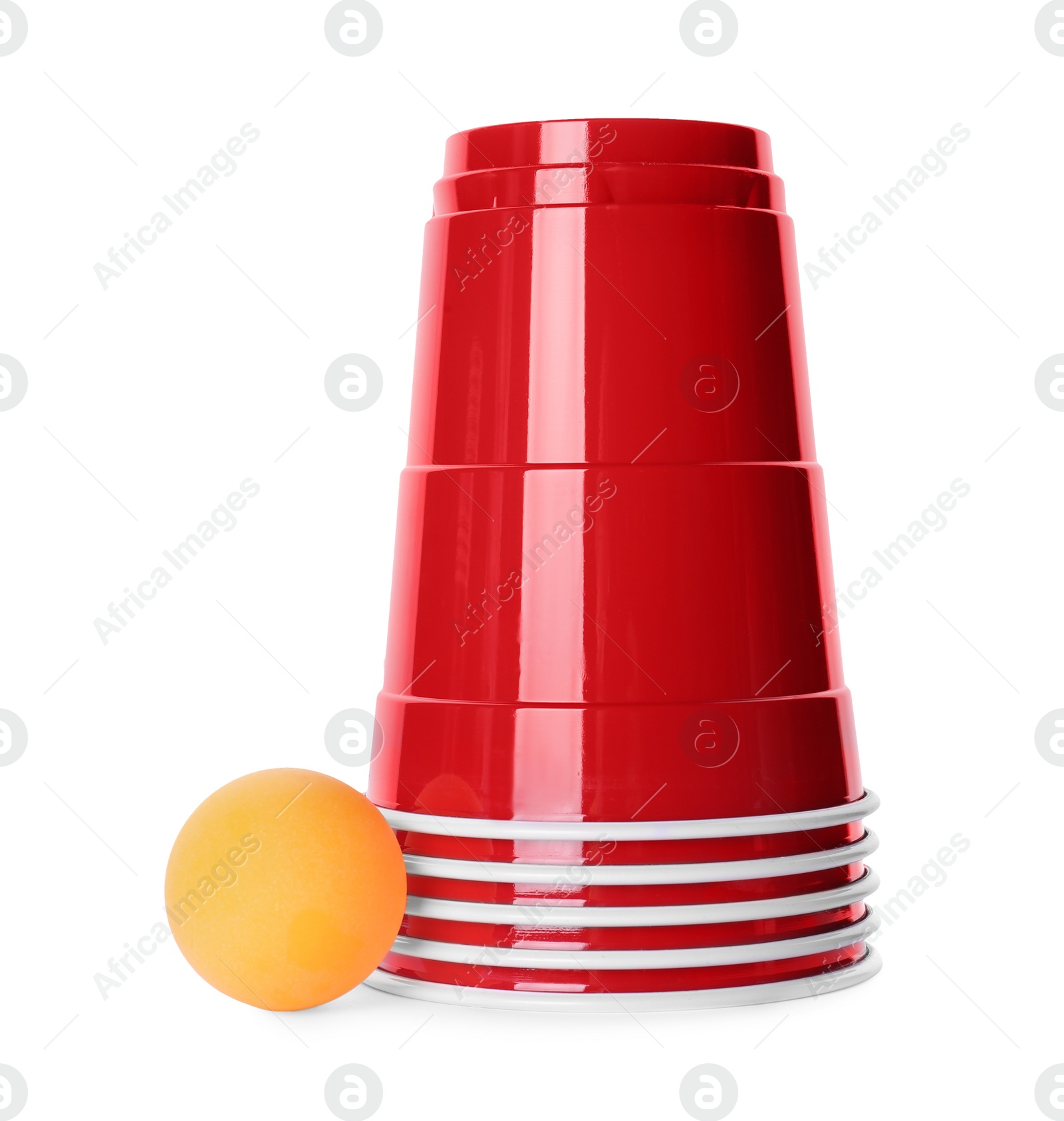 Photo of Red plastic cups and ball for beer pong on white background