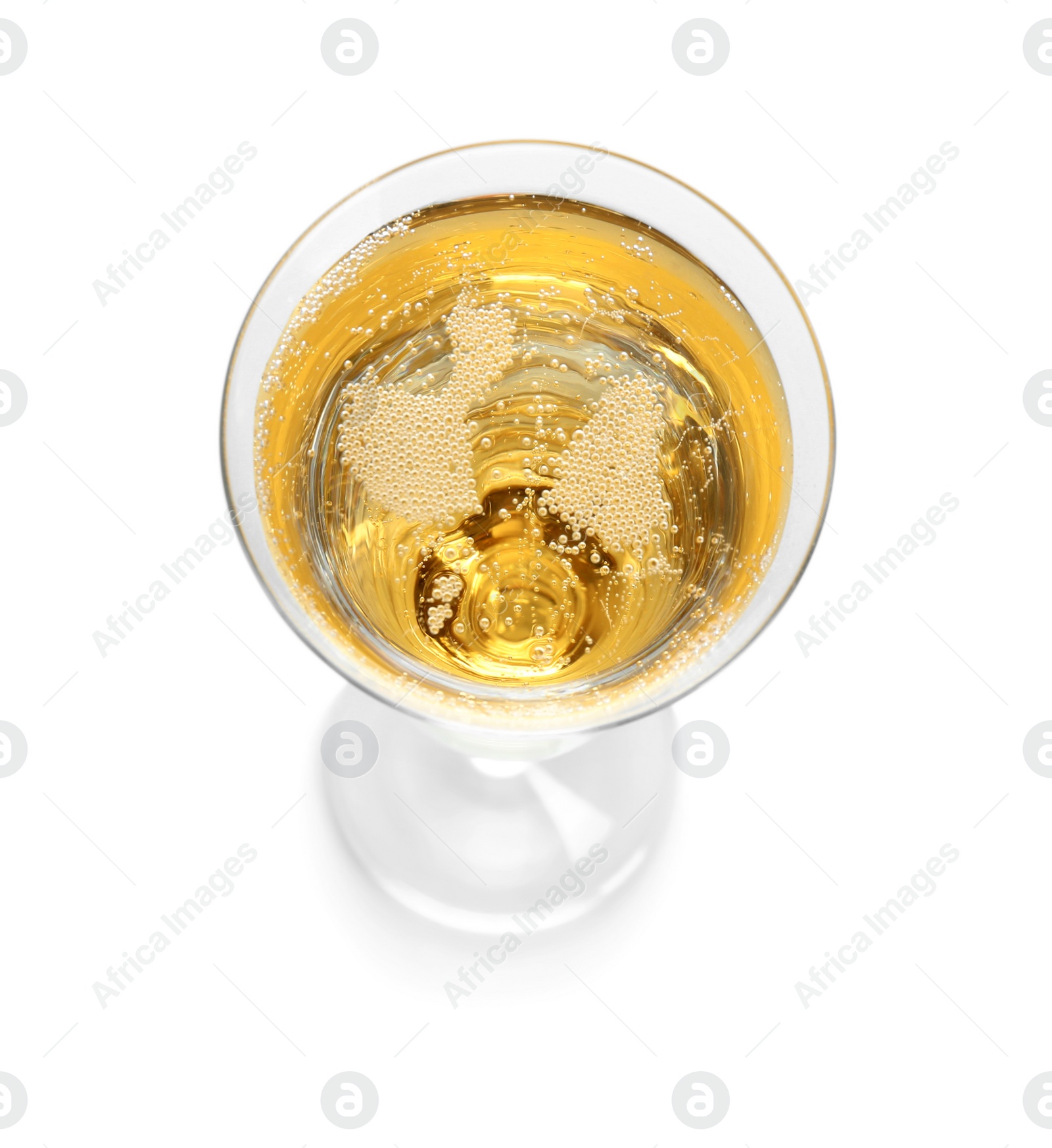 Photo of Glass of champagne on white background. Festive drink