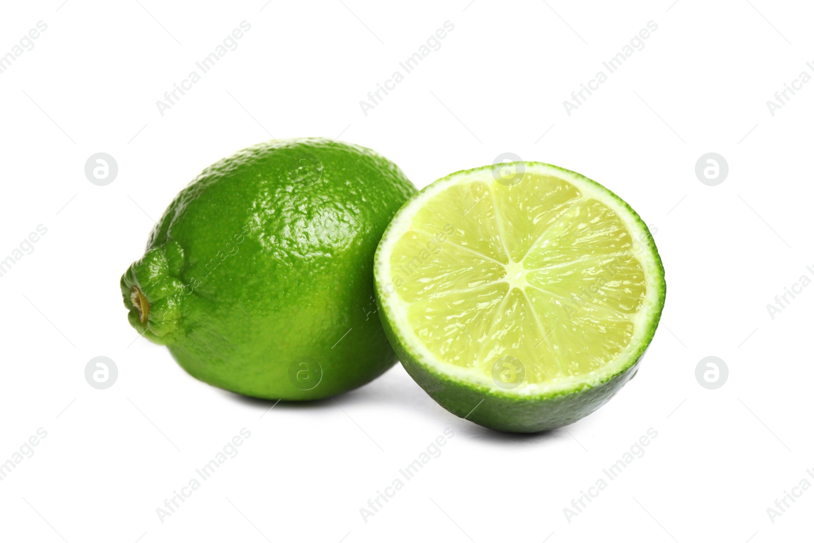 Photo of Fresh ripe green limes isolated on white