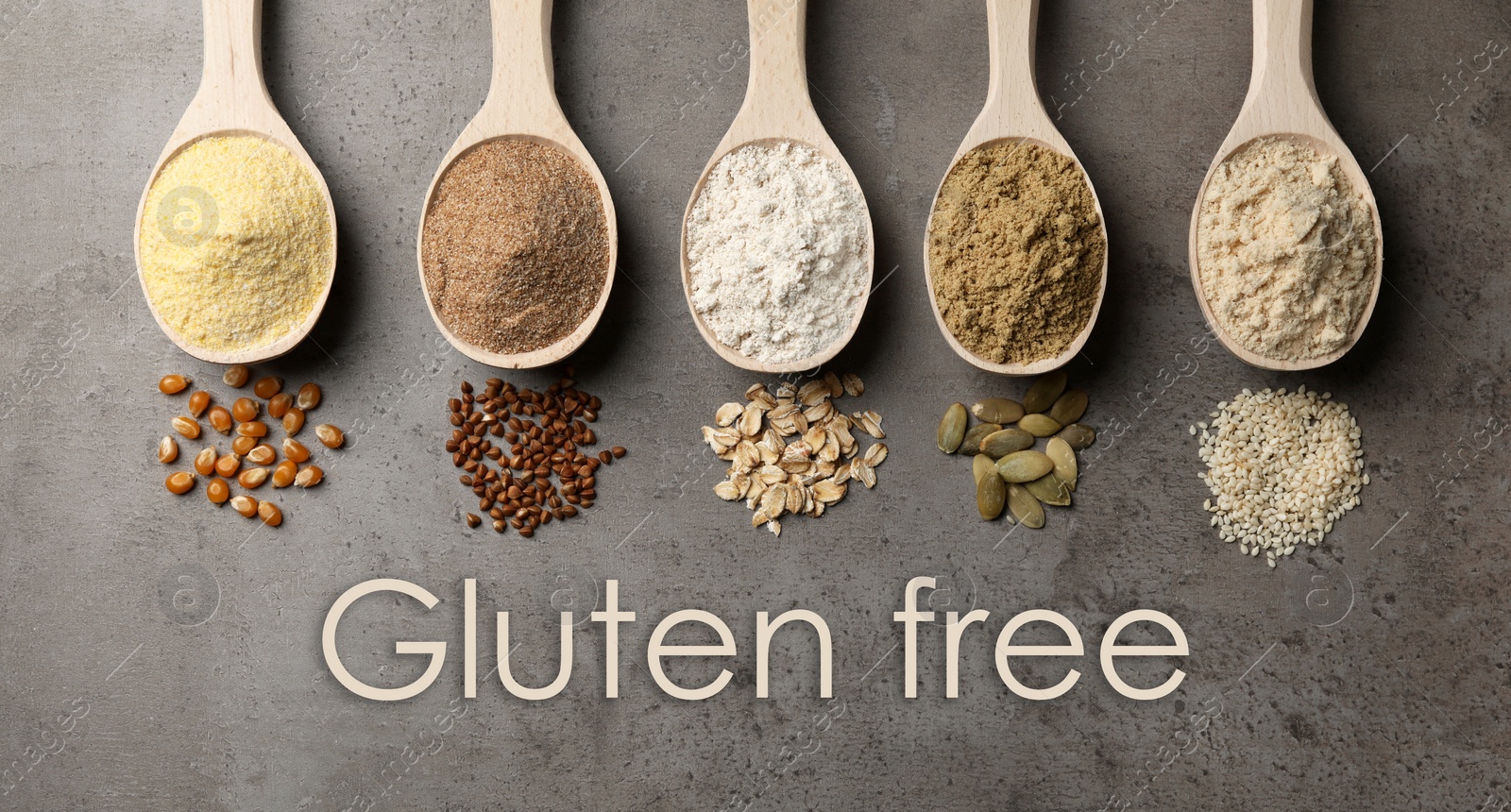 Image of Gluten free products. Spoons with different types of flour and text on grey table, top view