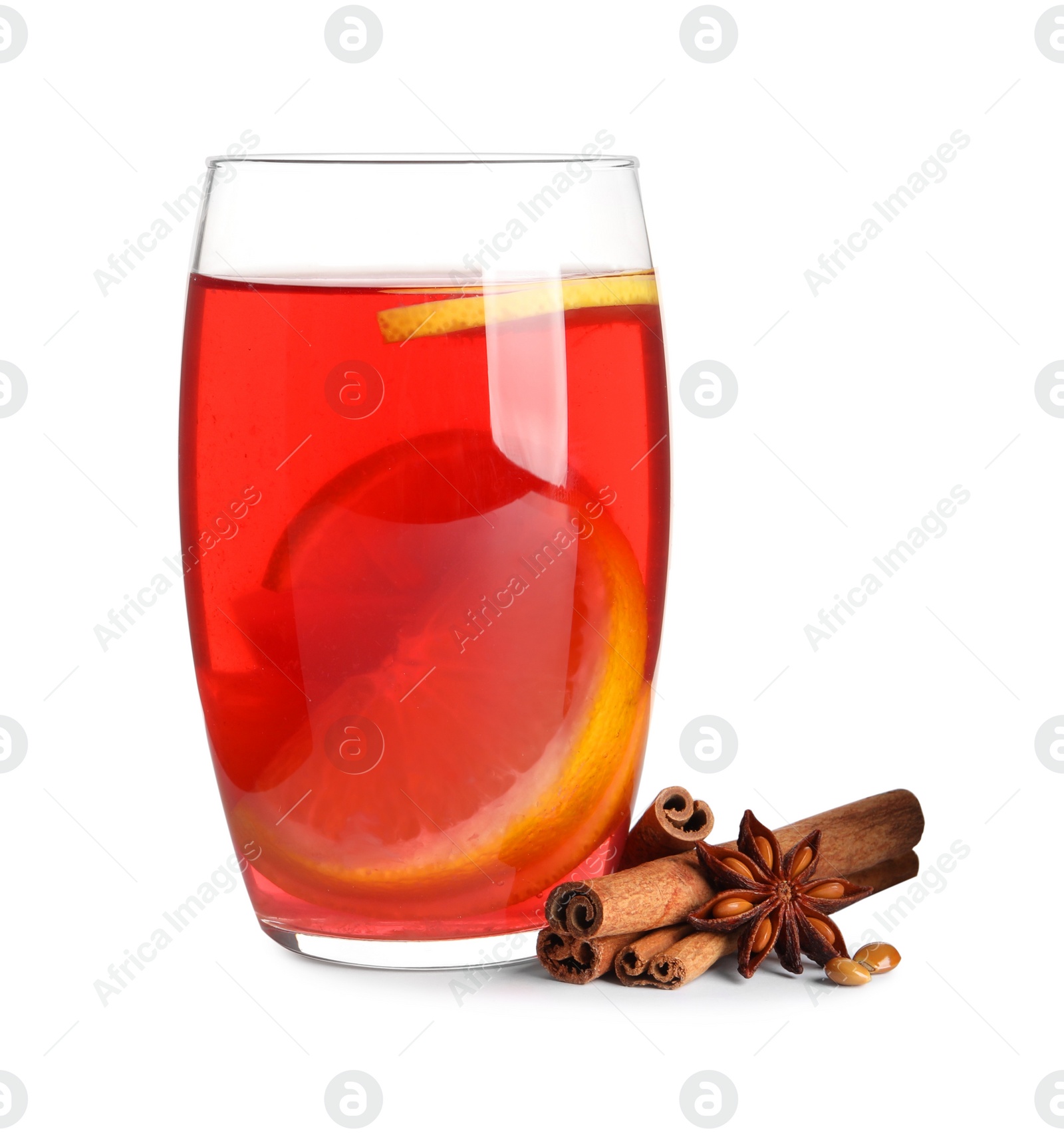 Photo of Glass of aromatic punch drink and ingredients on white background