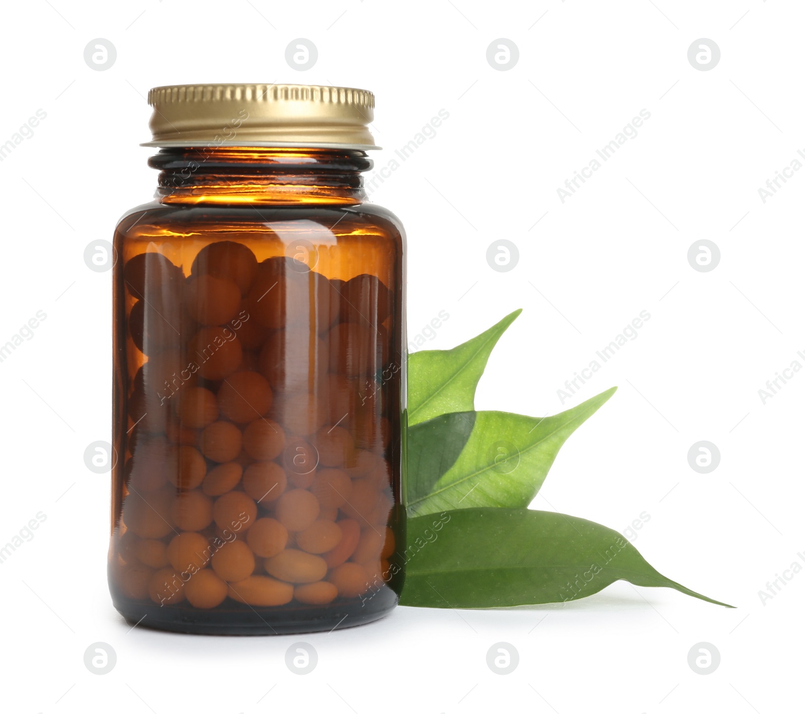 Photo of Bottle with vitamin pills and green leaves on white background