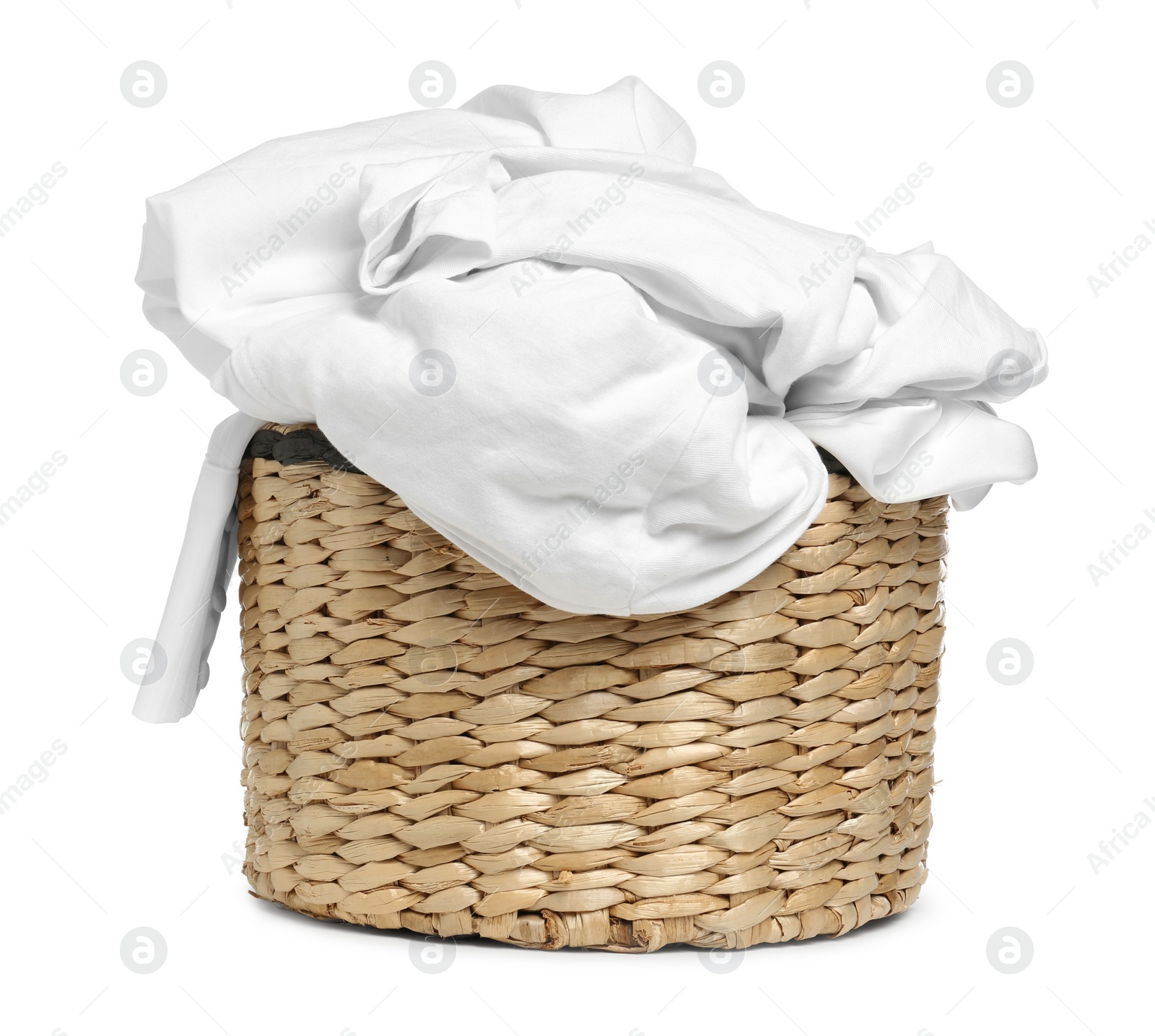 Photo of Wicker laundry basket with clean clothes isolated on white