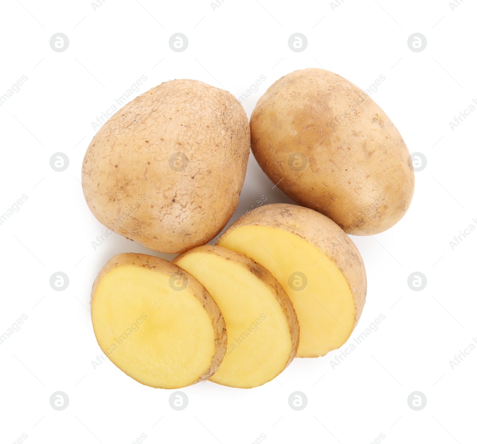 Photo of Whole and cut fresh potatoes on white background, top view