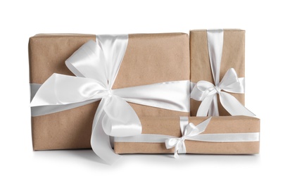 Beautifully wrapped gift boxes on white background