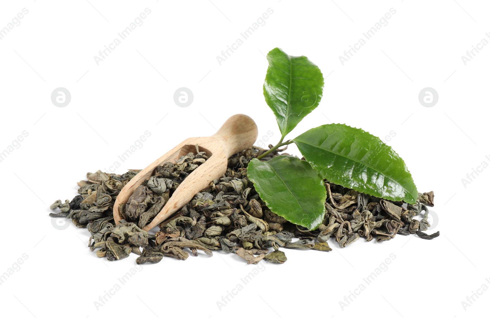 Photo of Fresh and dry leaves of tea plant with wooden scoop on white background