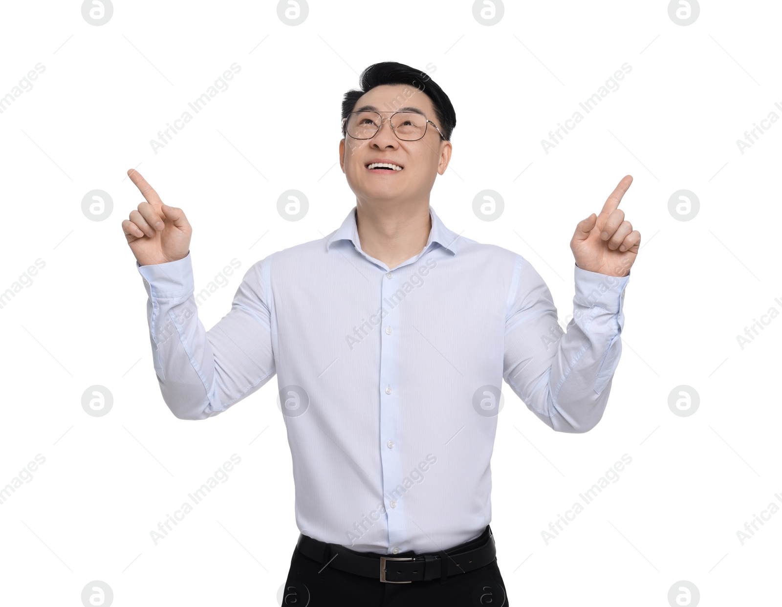 Photo of Businessman in formal clothes posing on white background