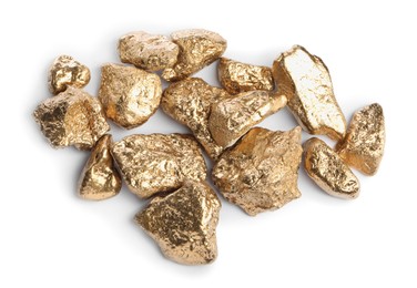 Pile of gold nuggets on white background, top view