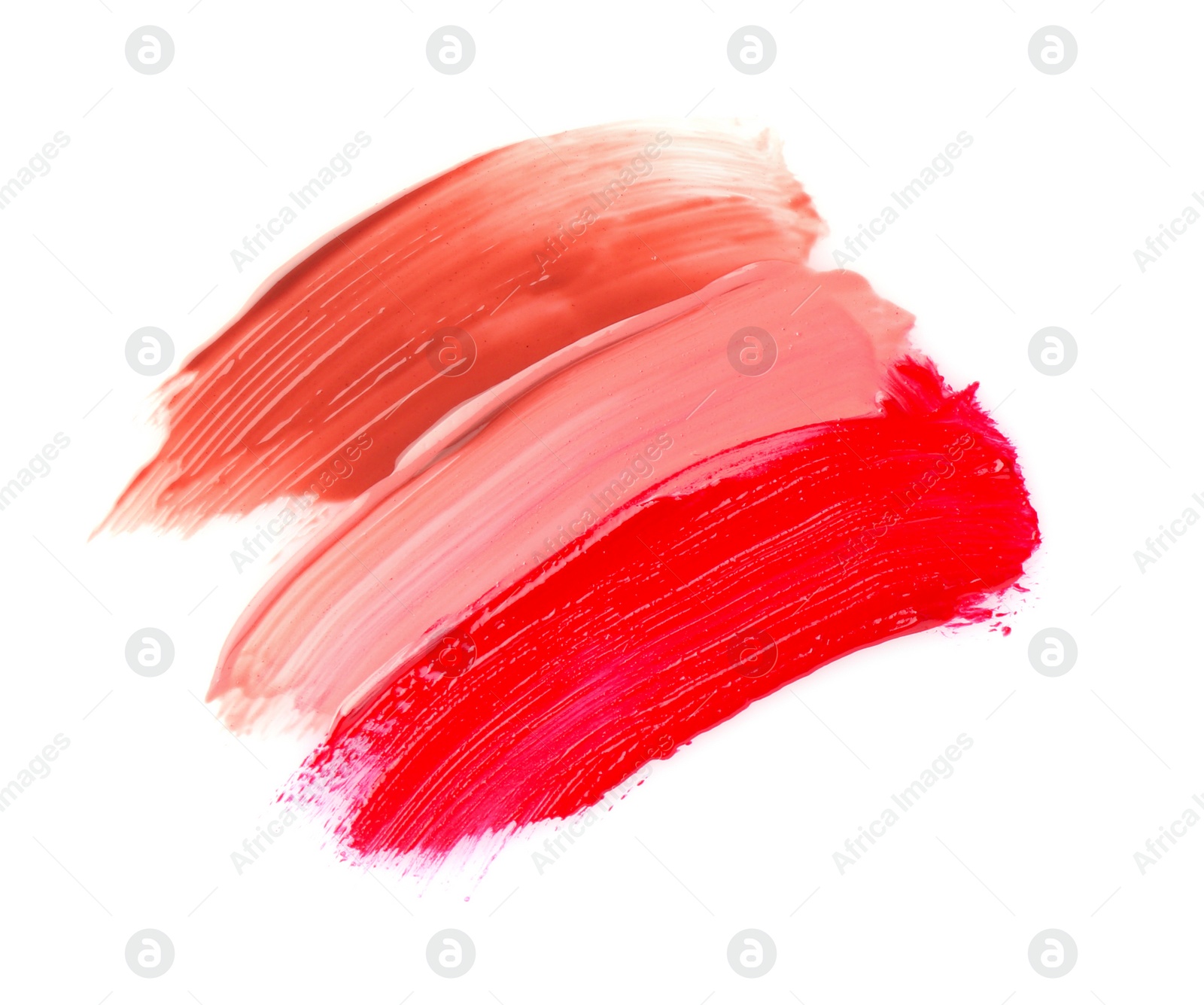 Photo of Strokes of different lip glosses isolated on white, top view