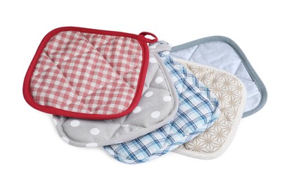 Set of oven potholders for hot dishes on white background