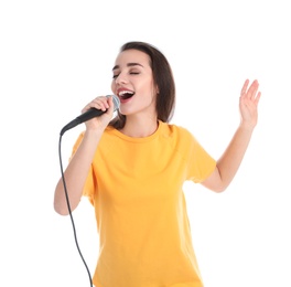 Photo of Young woman wearing casual clothes singing in microphone on white background