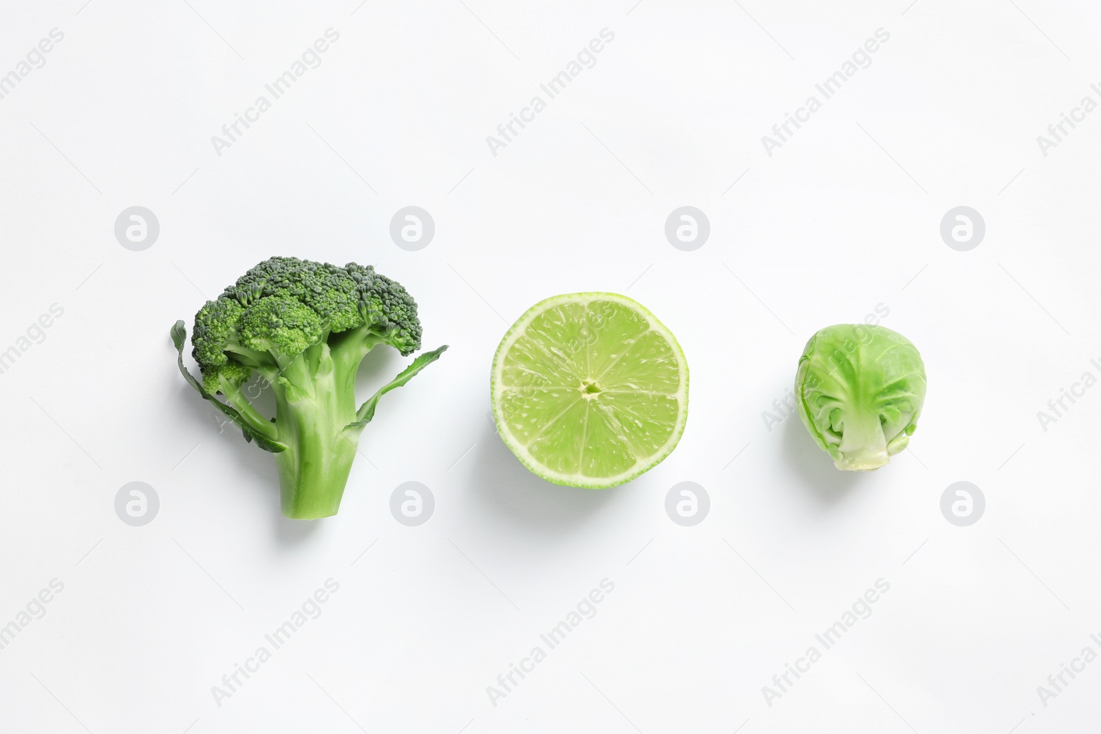 Photo of Fresh vegetables and fruit on white background, top view