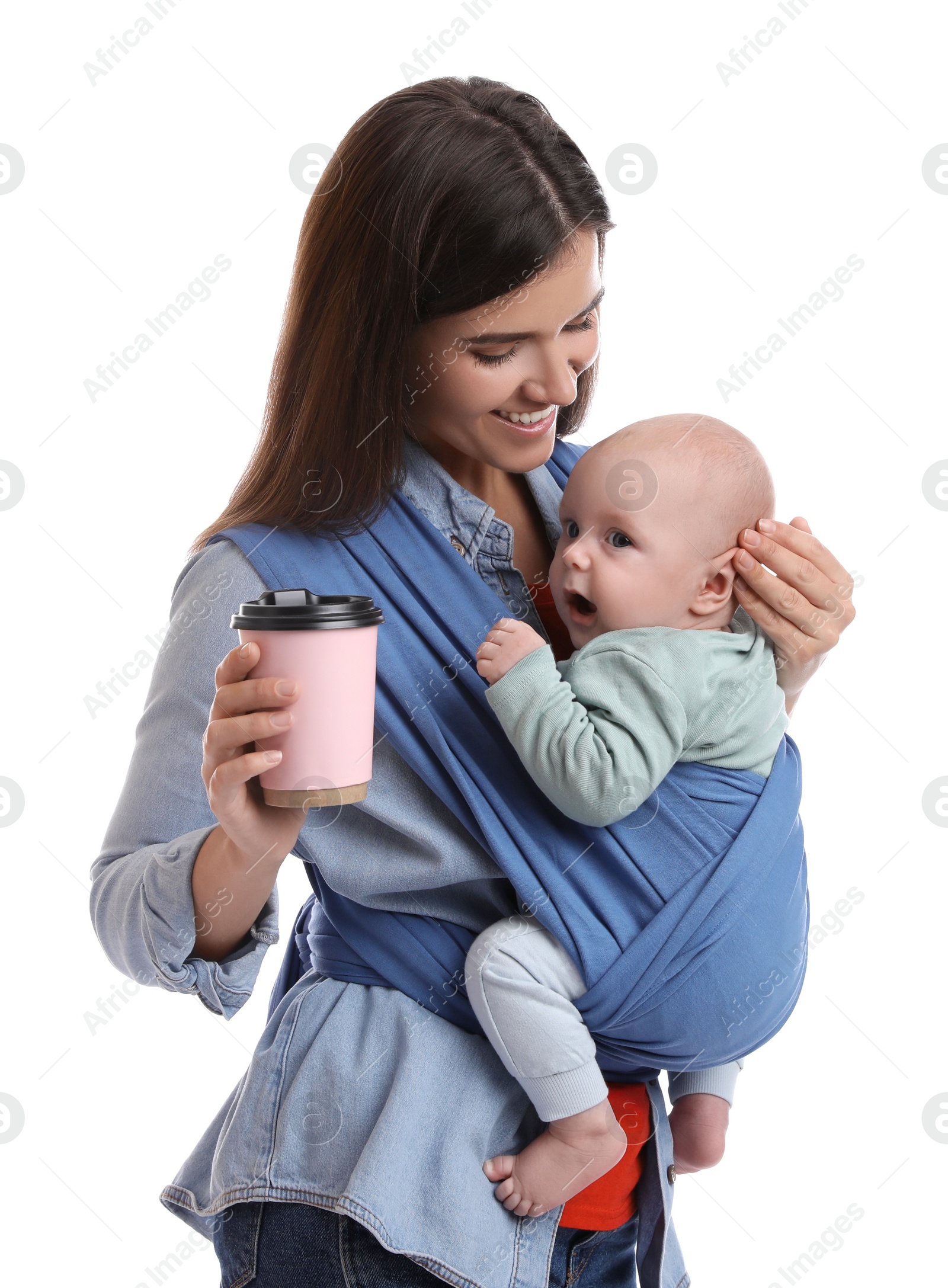 Photo of Mother with hot drink holding her child in sling (baby carrier) on white background