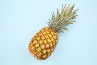 Photo of Delicious ripe pineapple on white background, top view. Exotic fruit