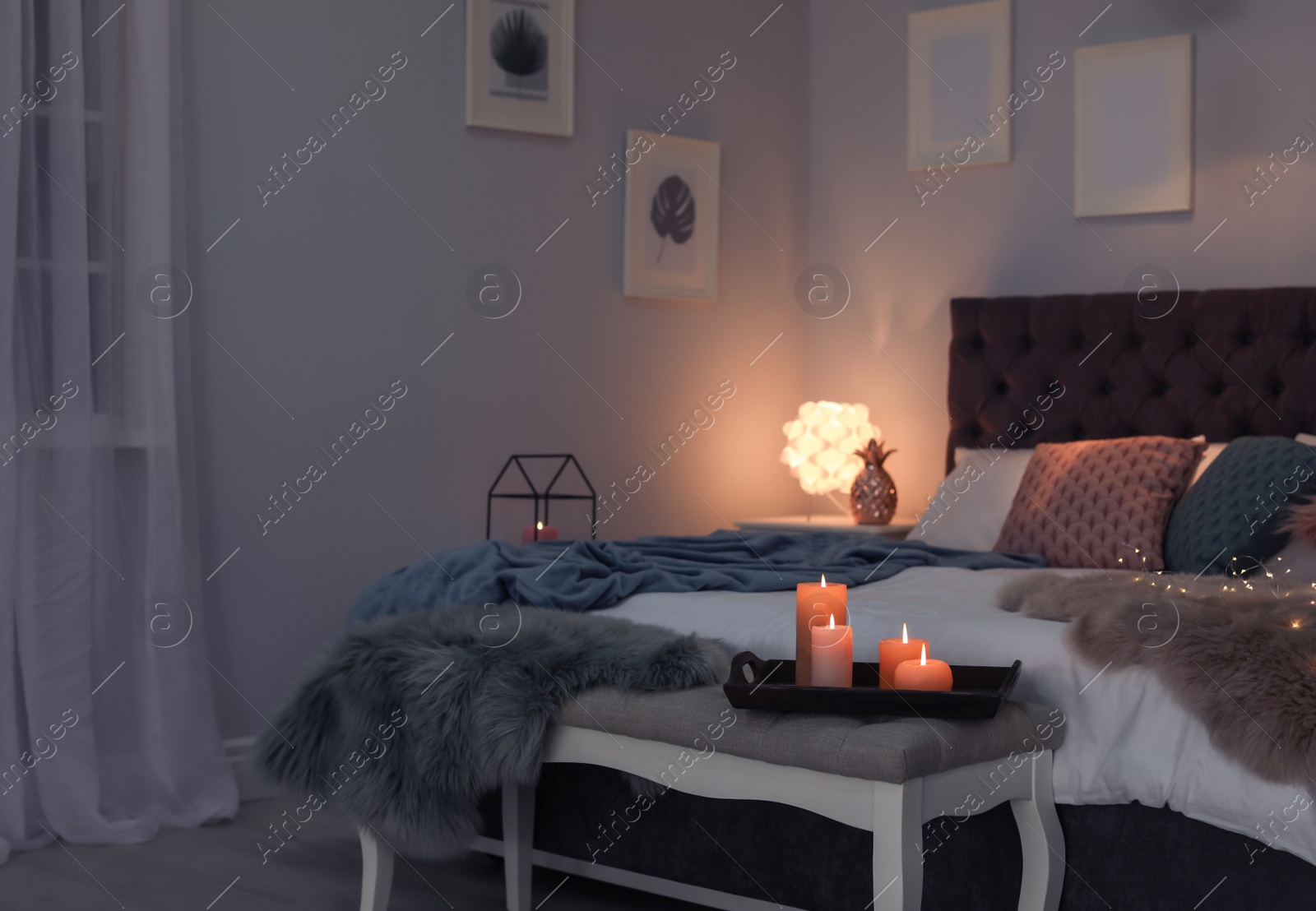 Photo of Stylish room interior with comfortable bed
