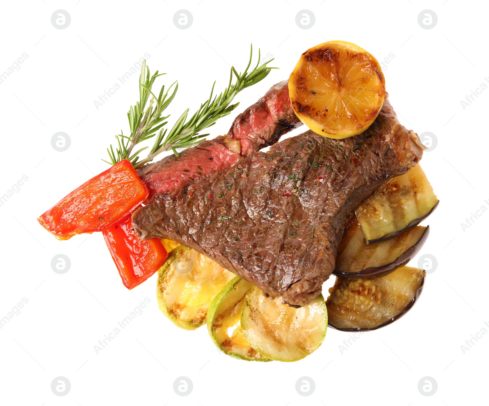 Photo of Delicious grilled beef steak with vegetables, spices and lemon isolated on white, top view