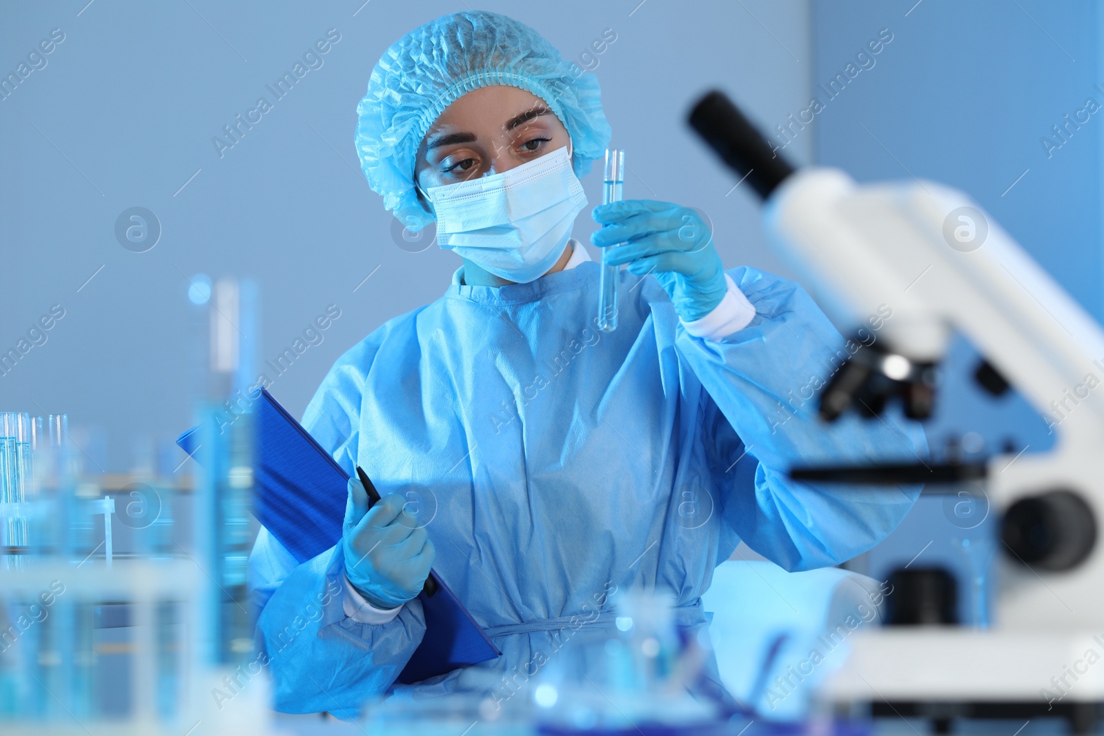 Photo of Scientist working with sample in laboratory. Medical research
