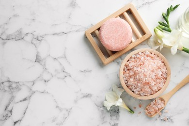 Photo of Flat lay composition with different spa products on white marble table. Space for text