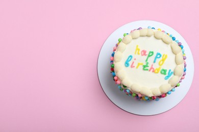 Cute bento cake with tasty cream on pink background, top view. Space for text