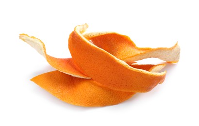 Pile of dry orange peels on white background