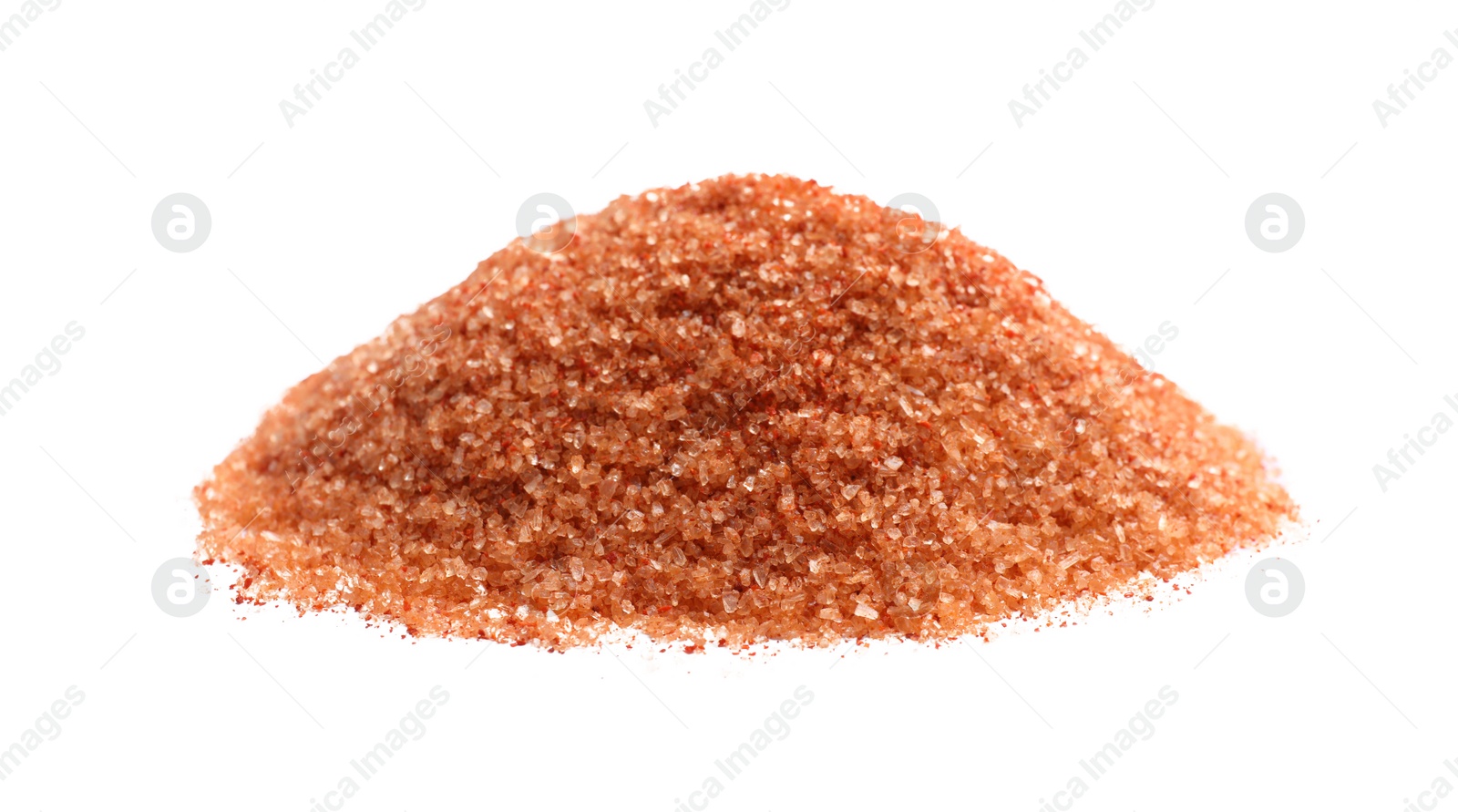 Photo of Heap of orange salt on white background