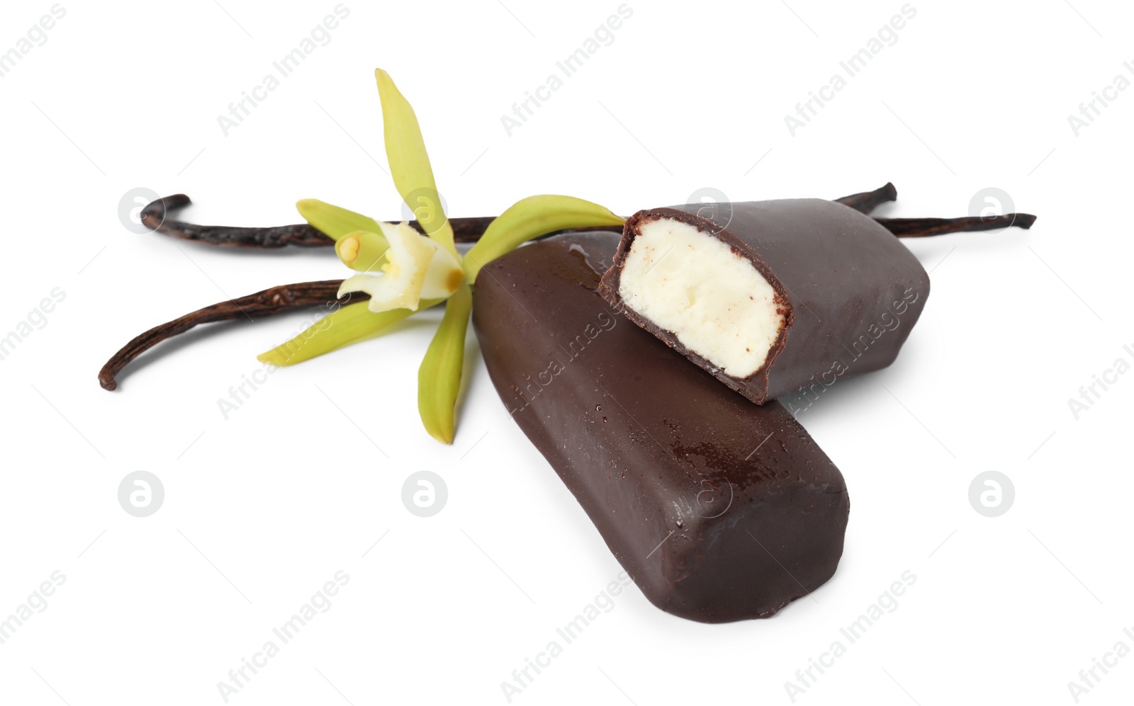 Photo of Glazed curd cheese bars, vanilla pods and flower isolated on white