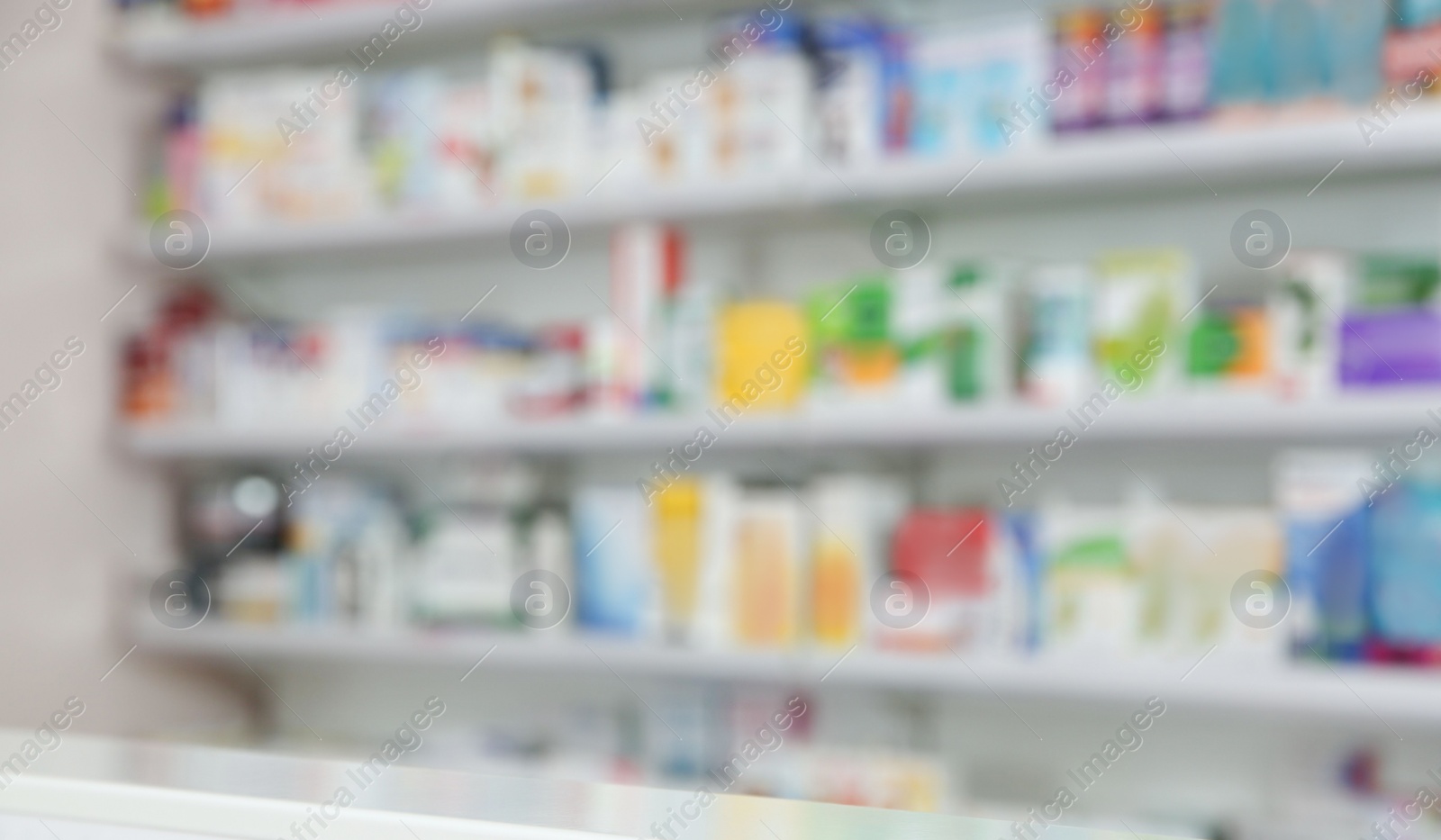 Image of Shelves with pharmaceuticals in drugstore, blurred view. Banner design