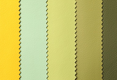 Leather samples of different colors for interior design as background